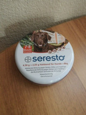 Leere runde Blechdose Hund