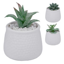 Kunstpflanzen im Topf