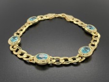 ARMBAND AUS 375/- GELBGOLD MIT  ZIRKON BLAU FACETTENREICH SCHMUCKJAGD
