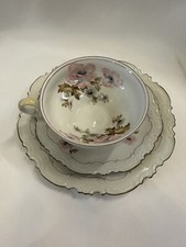 Sammeltasse mit Blumenmotiv