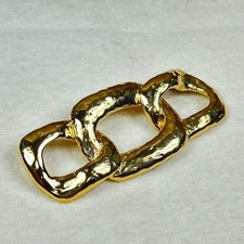Yves Saint Laurent Brosche