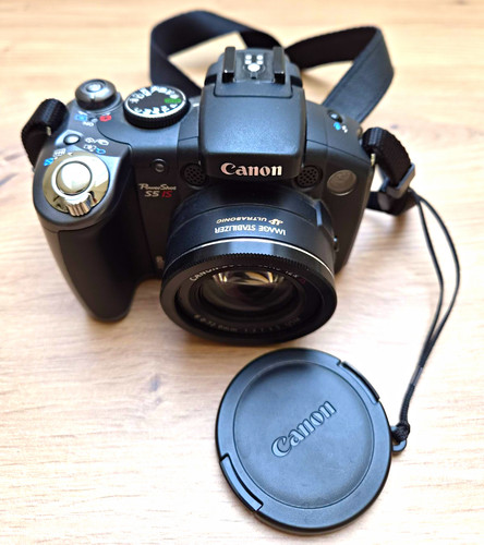 Canon powershot is - s5,