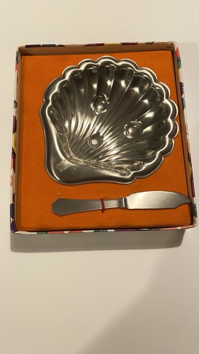 Muschelschale mit messer - ,