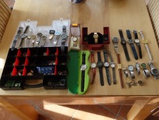 Konvolut- Alte und neue Armbanduhren, Junghans und weitere, Ersatzteile