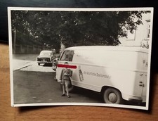 Little Boy in Front of Van -