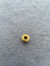 Vintage golden guitar bushing