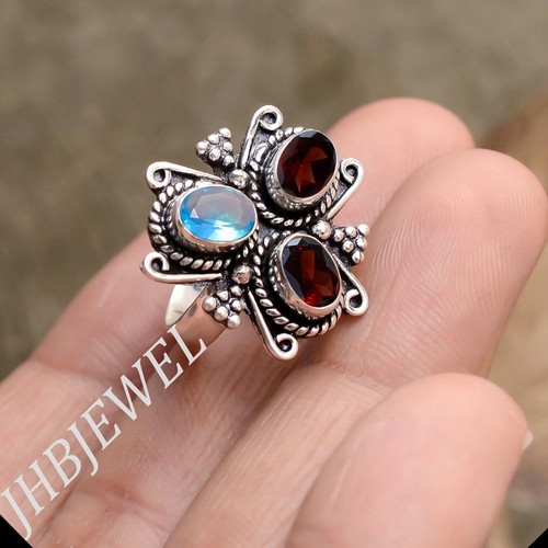 Ring mit rotem granatschliff - ring,