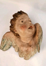 Geflügelter Engelskopf