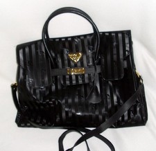 Maison Mollerus Luxusmarke der Schweiz - Vintage Kelly Bag in schwarz