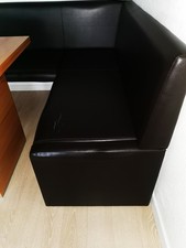 Eckbank dunkelbraunes Kunstleder und Esstisch Holz