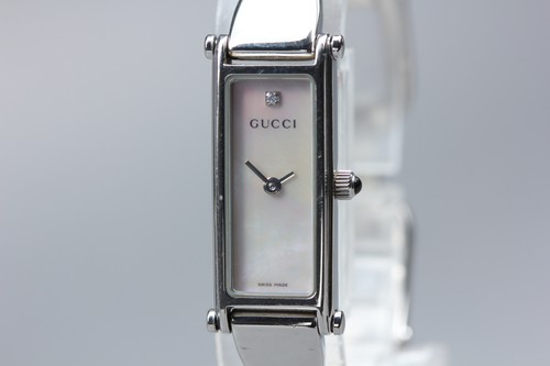 Near mint gucci 1500l - gucci, silver