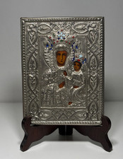 Versilberte Metallikone