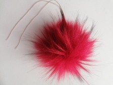 Rote kunstfell bommel - bommel, mit