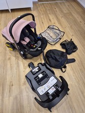 Doona mit Isofix, Regenhaube, Reisetasche, Sonnenschutz, in Pink