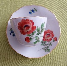 Meissen Moccatasse mit Untertasse, rote Blume. I Wahl