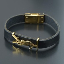 Yves Saint Laurent Lederarmband mit Logo Schwarz Gold Echt