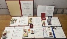 Konvolut DDR Orden Abzeichen NVA GST Zivilverteidigung Kampfgruppen Urkunden