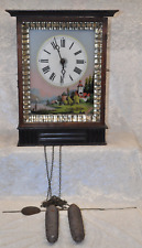 Antike - Wanduhr - Hinterglasmalerei -  Zahnräder - in - Holz - gelagert