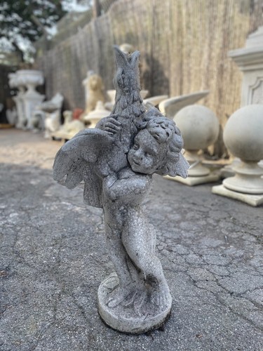 Junge und gansfigur - gansfigur, kleiner