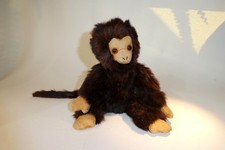 Stofftier Affe aus dunklem