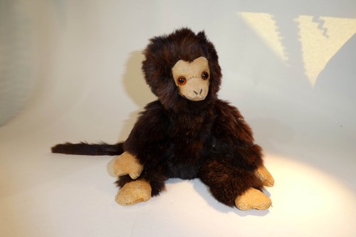 Stofftier affe aus - affe, dunklem