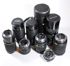 Konvolut mit 7 Objektiven für Minolta MC/MD Bajonett, defekt für Bastler