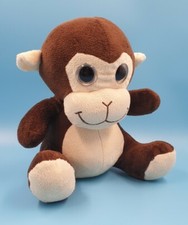 Plüsch Affe mit großen Augen