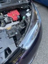 Halter für Scheinwerfer links