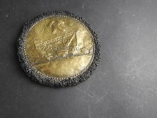 Bergbau Erinnerung Eimerkettenbagger im Tagebau Messing auf Holz am Rand Kohle