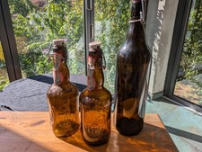 3 x Bier-Flaschen braun mit Bügelverschluss .Leer 2x0,5 Liter -1x 1 Liter  Saft