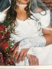 Brautkleid von LOHRENGEL CASSEL im Carmen Stil