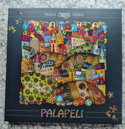 Puzzle curiosi palapeli 210 - curiosi,