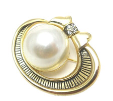 elegante goldfarbene Brosche