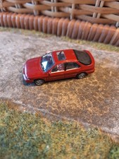 Modellauto 1:87  von Rietze  Ford Mondeo Ghia  mit Figur