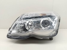 6500100000 LINKER SCHEINWERFER