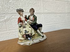 PORZELLANFIGUR SITZENDES PAAR