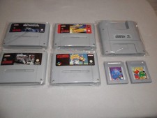 Konvolut von 4 Super Nintendo Spielen + Super Gameboy  mit 2 Gameboy Spielen.