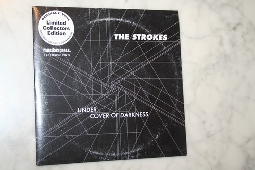 The strokes under cover of - under,