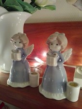 Zwei Porzellan Engel Mit