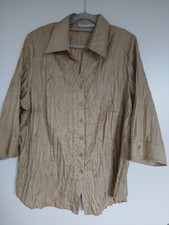 Festlich schimmernde Bluse