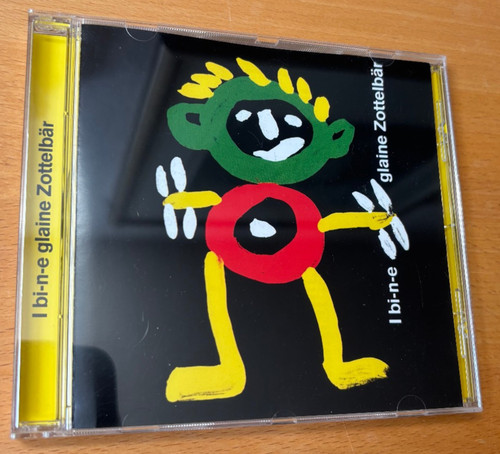 E glaine zottelbär - i,