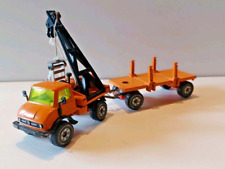 Siku - 2820 -1:55- Rohrverleger Mercedes Unimog U 406 mit Ladekran und Anhänger 