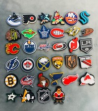 Jibbz Crocies Schuh Charms über 30 Snoopy Spongebob NHL Eishockey Sport