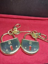 CH, Carolina Herrera, adlock