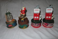 Vier alte COCA COLA Spieluhren