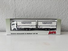 AWM | 1:87 | MAN | Jumbo-Gardinenplanen-Tandemanhängerzug | Euro-Baustoff