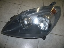 Linker Frontscheinwerfer Opel Zafira B  13252472