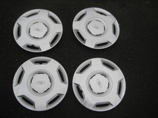 Satz Radkappen Orig.Ford 14 Zoll T/w vekratzt.Foto.