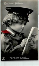 51894478 - Zeitung lesen Schwarz-Weiss-Rot WK I Feldpoststempel Kinder in