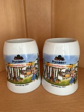 2 Bier-Steinkrüge "Pyraser
